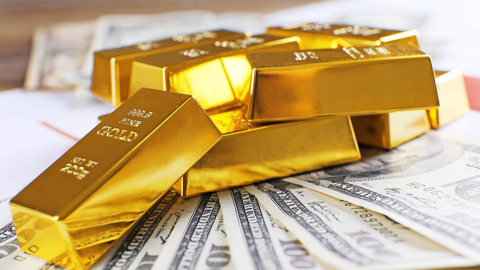 Стоит ли вкладывать деньги в золото в 2022 году: плюсы и минусы инвестиций